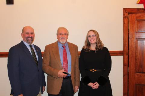 Dean Scarborough (center) received the council member of the year award from the Georgia Mountains Regional Commission. Making the presentation were GMRC chairman Sam Norton (left) and GMRC executive director Heather Feldman (right).