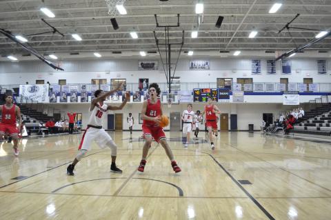 Dominic Forbes goes for a layup 