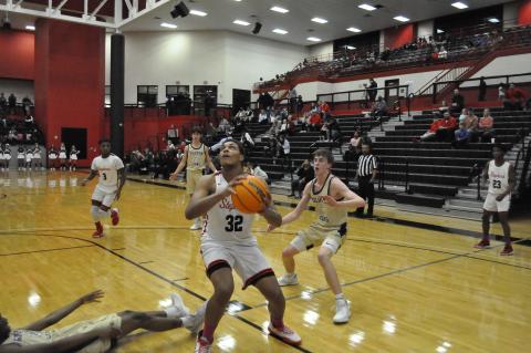 DJ Hampton looks to score against St. Pius