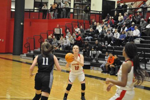 Lindsay Moore shoots a three