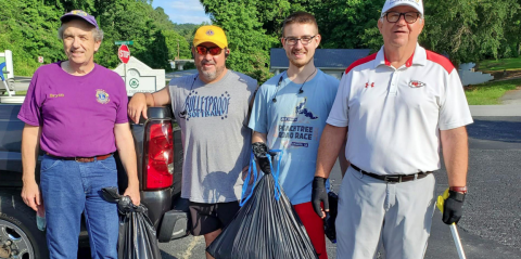 Pictured are Lions Club members resting after cleaning up litter along Falls Road last Saturday.  They are (from left) Bryan Gordon, Tim McLaughlin, Jack McLaughlin and Jack McLaughlin. Lions not pictured are Brenda Gordon, Jack Barnard and Dan Huff.  