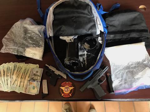 These are some of the suspected drugs, cash and a handgun seized during a recent traffic stop that led to the arrest of three people.
