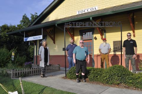 Pictured with the new photo frame area at the Chamber are (from left) Julie Paysen of the Chamber of Commeerce, Paul Cawley of ASI-Southeast, Kyle Eller of ASI-Southeast, Roger Ward of ASI-Southeast, and Dusty Bolman of North Georgia Technical College.