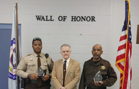 Receiving deputy of the year and jailer of the year awards were Daniel Dixon (left) and Dondi Nelson (right). The awards were presented by Stephens County Sheriff Randy Shirley (center).
