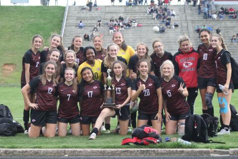 SCHS soccer team with their Region 8-AAA runners-up trophy 