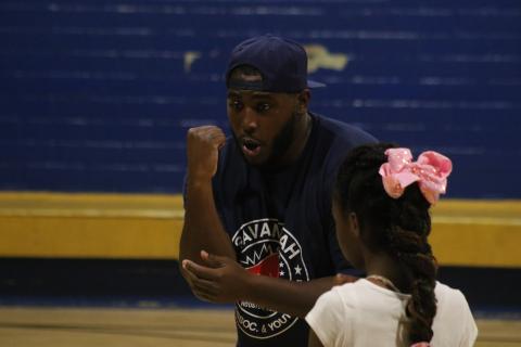 Eric Perry demonstrates in a boxing clinic 