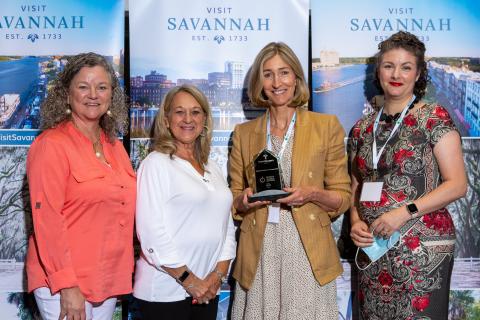 Pictured are World War II Heritage Trail vice chairman Darlene McLendon of the  Museum of Aviation; Brenda Carlan of the Currahee Military Museum;  Trail chairman Sherri Jones of the  World War II Home Front Museum, and Pearl Fyderek of the  Mighty Eighth Museum. They accepted the award on behalf of the 10 partner sites.
