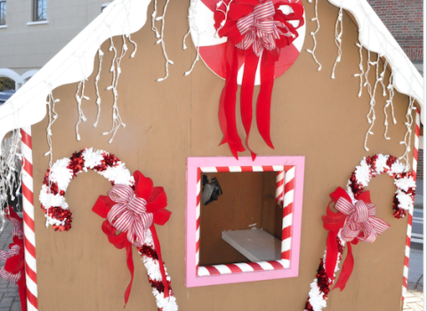 The brightly decorated gingerbread house on Doyle Street has already drawn the attention of many local youngsters. It will be a focal point of activity during Christmas Fest on Friday.