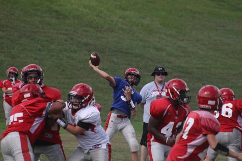 Branson Stowe throws a pass during a SCMS practice.