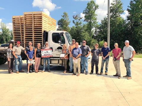 Pictured are (from left) WBL coordinator LaDonna Bartmas, Hollow Springs Farms owner Peter Traudt, Michael Pless, Cooper Pless, Kelly Pless, Garrett Pless, CTAE director Pam Hill, Bradley Westmoreland, WBL coordinator Rod Pipkin, SCHS welding instructor Chris Holland, John Hughes, Jacob Traudt, Trent Brooks, Samuel Traudt.