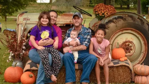 The Johnson family includes father Zachary, mother Jennifer and daughters  Ily, Ember and Aurora.