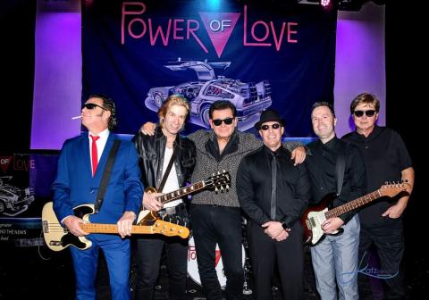 he Power of Love is a group of masterful, talented musicians performing the greatest hits of the most beloved and iconic acts in music history. Huey Lewis and the News’ 1983 album Sports, sold more than 10 million copies. Lead singer of Power Love is Tommy C (center).