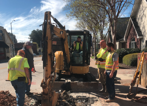 City workers repair a sewer line on Sage Street.