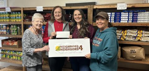 Pictured are Lucy Davis, vice president of Neighbors 4 Neighbors, Deborah Gibby,  president, Peach StateFCU Business Development Coordinator Brooke Westbrook, and Dee Scarborough, N4N scretary and member of the Peach StateFCU Northeast Georgia Region Advisory Board. Photo submitted by Dee Scarborough.
