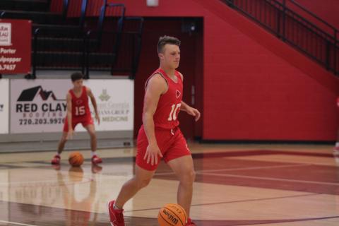 Rising senior Brock Tankersley dribbles the ball down the court.