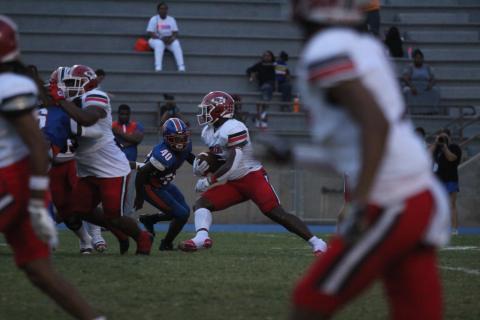 Senior Running Back Javin Gordon looks for a hole to run through in Friday night's game against Cedar Shoals.