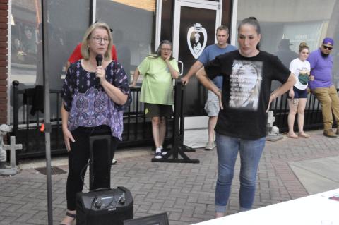 Kathy Whitmire, left, executive director for the Hope for a Drug Free Stephens oganization, and guest speaker Julie Russell, right, led a drug overdose awareness event on Thursday, Aug. 29, in downtown Toccoa.