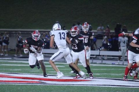 Javin Gordon carries the ball down the field during a home Stephens County football game this season.
