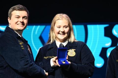 The Stephens County Future Farmers of America compete in Indianpolis in October. Teeghan Jameson, center, was a National Proficiency Award finalist and won the nation title in Environmental Natural Resource Management. On the left is Gran Norfleet, National FFA Secretary.