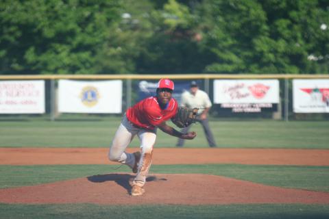 Carmelo Renfroe started the game pitching for Toccoa. Above, he is pitching a volley. Photo by Laura Shaw