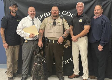 The Stephens County Sheriff’s Office welcomed K-9, Taz, following the death of the previous K-9 there, Champ, on Sunday, Oct. 19. Pictured from left to right are K9 Justice Dog Training owner Wesley Ballenger, Maj. Bill Zigan, Sgt. David Kiser, Sheriff Rusty Fulbright, and Maj. Jimmy Mize.