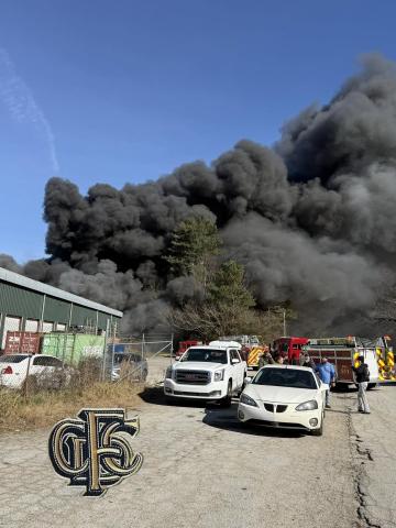 A brush fire on the afternoon of Wednesday, Dec. 31, shut down a section of Hwy. 123 in Toccoa as firefighters worked to contain the blaze.