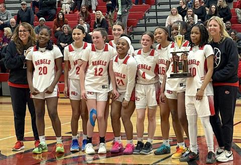 The eighth grade girls basketball team celebrates winning the conference championship after winning the season-ending tournament. Team members are (not in order) Rylee Grafton, Ella Fletcher, Jadaya Montgomery, Kiya Morgan, Emma John Crunkleton, McKennuh Merritt, Legacie Johnson, Brooke Wiley and Raquel Gunter. Head coach was Amanda Powell assisted by Delicia Fortson.