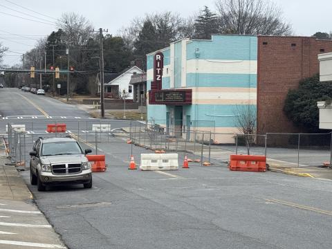 Work on a $3 million expansion project at the Ritz Theatre in downtown Toccoa has begun, as indicated by a portion of Doyle Street being fenced off to be used as a staging area for construction materials.