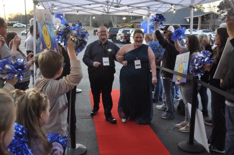 Clyde Williams, left, was one of the more than 100 Kings and Queens who attended the third annual Night to Shine event hosted by Ebenezer Baptist Church in Toccoa on Friday night, Feb. 13. His chaperone, known as a “buddy,” was Karli Cobb, right.