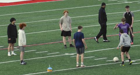 The Indians boys soccer team prepares to start practice.