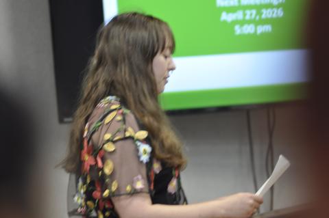 Olivia Adams, owner of Magic Oven in downtown Toccoa, presents a petition to the City of Toccoa asking them to reinstate the Ida Cox summer concert series in full.