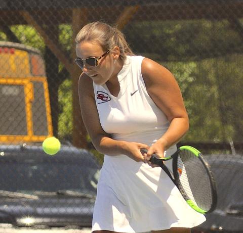 Makayla Rogers gets ready to hit the ball back over the net during the playoffs.