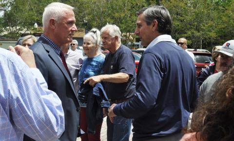 U.S. Senate candidate Derek Dooley has a chat with Stephens County Sheriff Rusty Fulbright.
