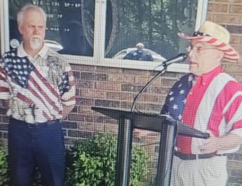 Stacey Simmons, left, and Roy English, right, participated in the Toccoa Elks Lodge's Flag Day ceremony on June 14.