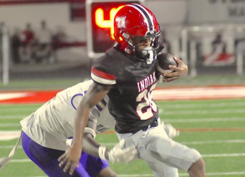 Duke Collins tries to evade a Union County opponent.