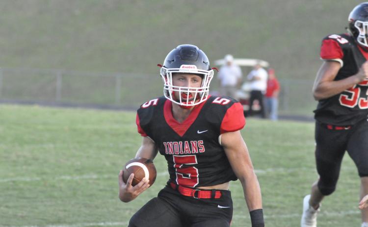 Hudson Spurlcok runs up field against White County. Photo by: Marcus Etienne