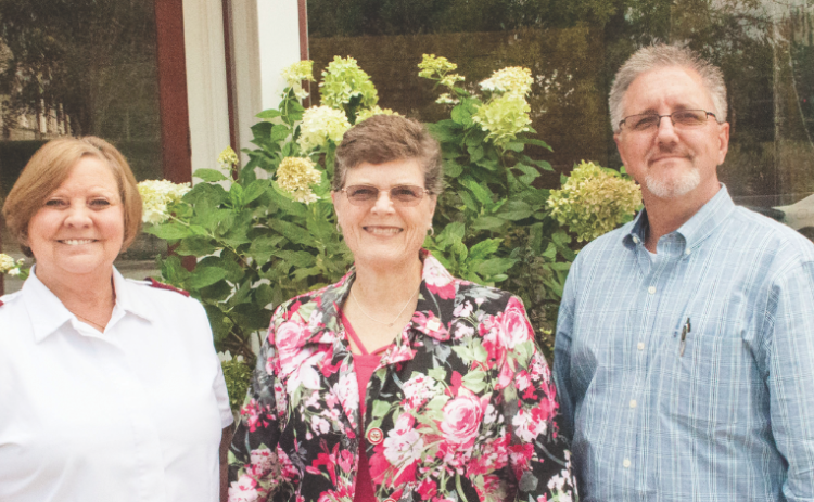 Pictured are Maj. Nancy Fuller, service center director Rebecca Dixson, and Salvation Army State of Georgia service extension director Jim Morrow.