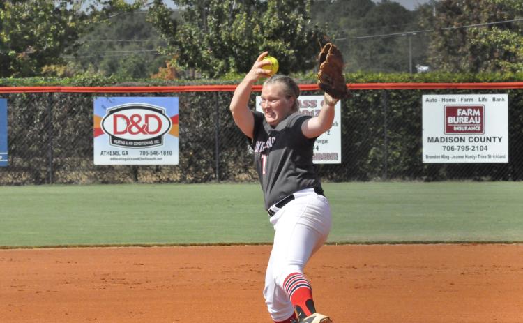 Aly Singletary fires a pitch in the region tournament