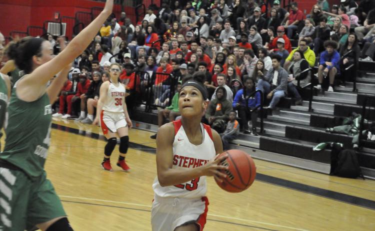 Kiki Howard goes up for a layup against a Franklin County player