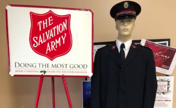 Iconic Salvation Army red kettles will be accompanied by human bell-ringers. This season apps to make a donation at the kettle also are offered.