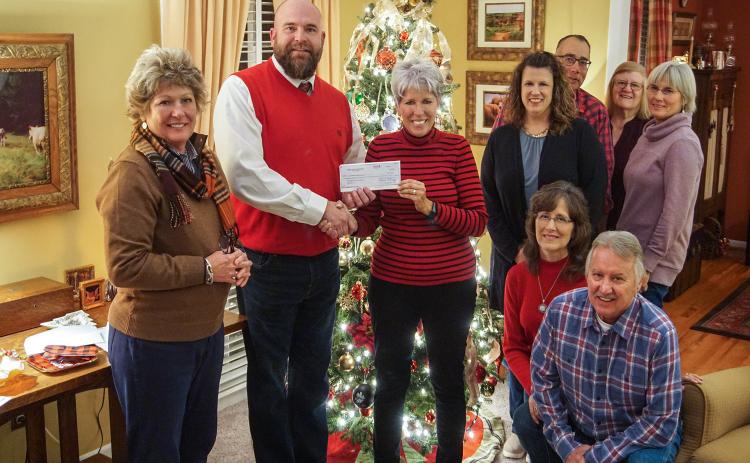Pictured are (kneeling) Diana Prather and Jody Prather. Standing at rear are Anne Shurley, Jeremy Spradlin, Angie Ramage, Michelle Ivester (Stephens County Commissioner), Lloyd Fox, Jeannie Fox and  Lindy Harrell. Not pictured are  Kelly Vickers, Dave Jalovick, and Patricia McGarvey.