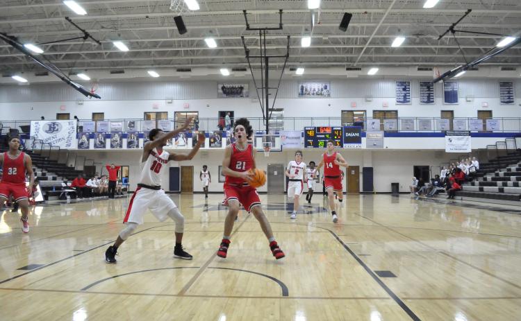 Dominic Forbes goes for a layup