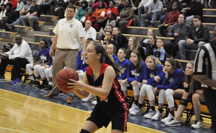 Lindsay Moore shoots a three