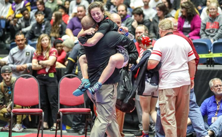 Athena Malek celebrates title