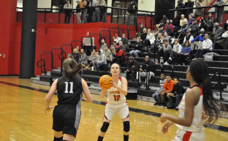 Lindsay Moore shoots a three