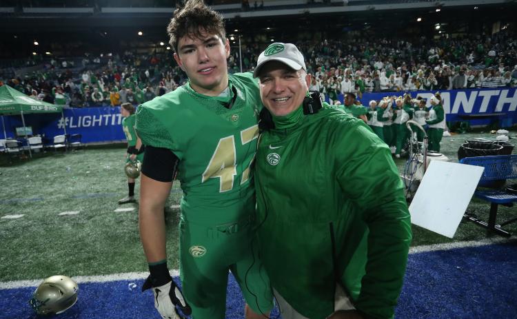 Bryan Rogers (right) and son Brett