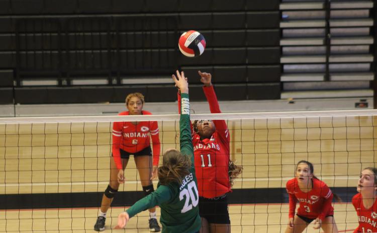 A'niya Mayweather going up for a block