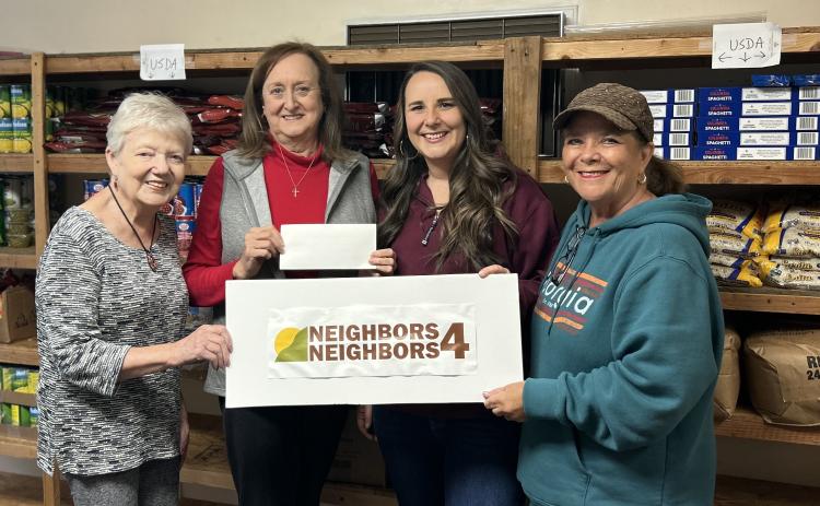 Pictured are Lucy Davis, vice president of Neighbors 4 Neighbors, Deborah Gibby,  president, Peach StateFCU Business Development Coordinator Brooke Westbrook, and Dee Scarborough, N4N scretary and member of the Peach StateFCU Northeast Georgia Region Advisory Board. Photo submitted by Dee Scarborough.