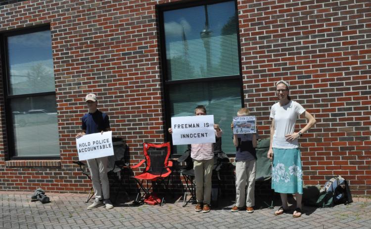 On Wednesday, July 2, the family of David Justin Freeman, who was charged with multiple charges in relation to an incident involving the Stephens County Sheriff’s Office on June 29, 2024, protested his arrest in front of the Stephens County Government Building. Photo by J. Todd Truelove