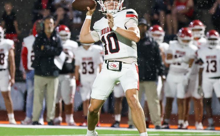 Branson Stowe passes the ball during the Battle of Currahee Mountain football game on Aug. 15 against the Habersham County Raiders. Landen Todd/The Northeast Georgian